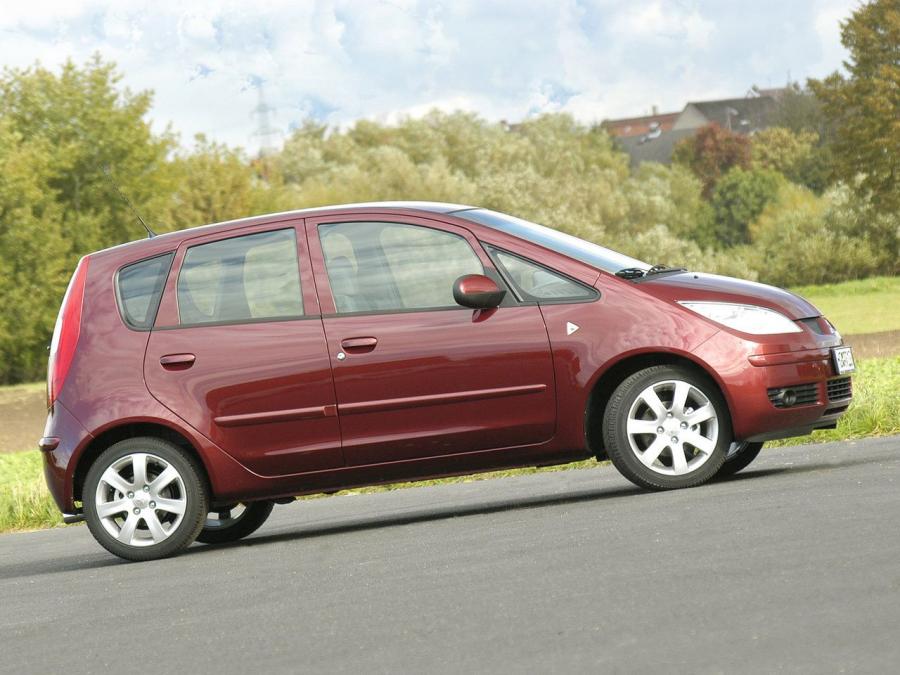  Mitsubishi Colt 5-Door 2004 года  (фото 21 из 29)
